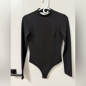 Black Dynamite bodysuit with open back